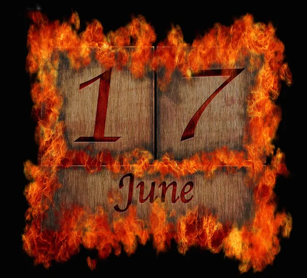 Burning wooden calendar June 17. — Stock Photo, Image