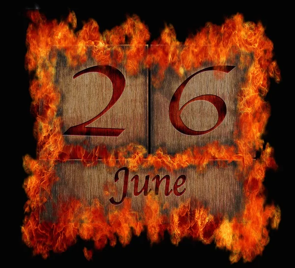 Burning wooden calendar June 26. — Stock Photo, Image