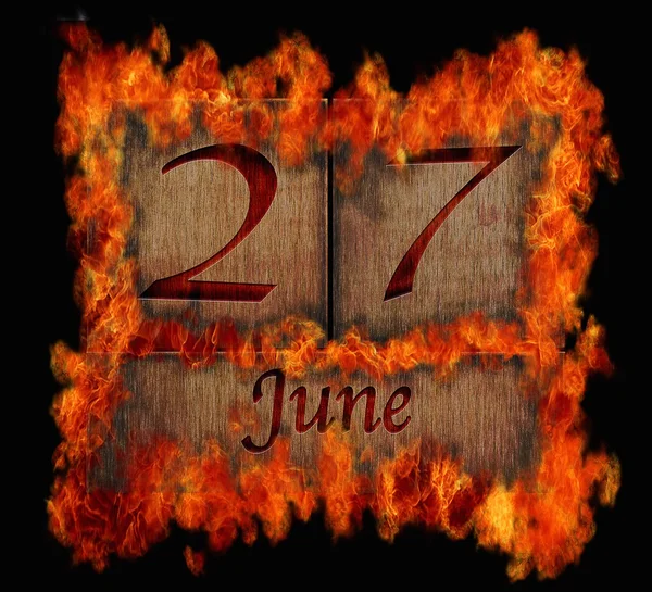 Burning wooden calendar June 27. — Stock Photo, Image