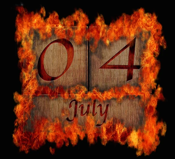 Burning wooden calendar July 4. — Stock Photo, Image