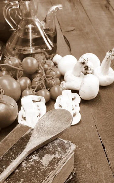 Cookbook and vegetables — Stock Photo, Image