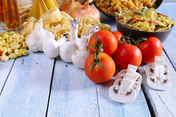 Tomato, mushrooms and pasta. — Stock Photo, Image