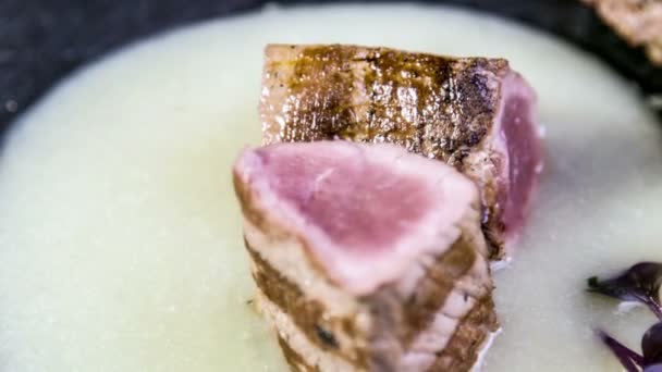 Lamb fillet and chop on asparagus cream — Stock Video