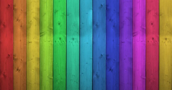 Colores del arco iris sobre fondo de madera — Foto de Stock