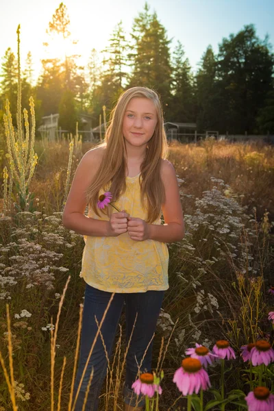 Teenage girl in a suburban or rural landscape — Stock Photo, Image