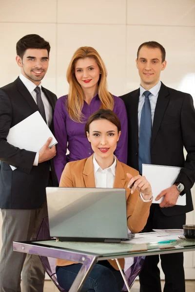 Business woman with her team — Stock Photo, Image