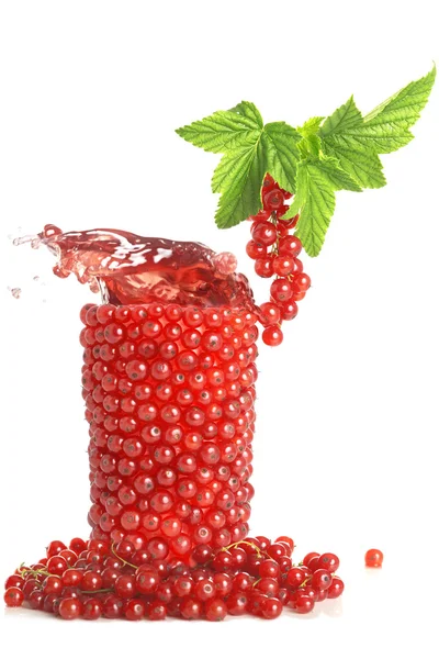 Glas Beeren mit Saft Stockfoto