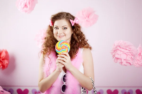 Sexy young woman in pink room — Stock Photo, Image