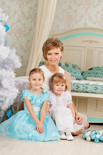 Happy family smiling at home — Stock Photo, Image