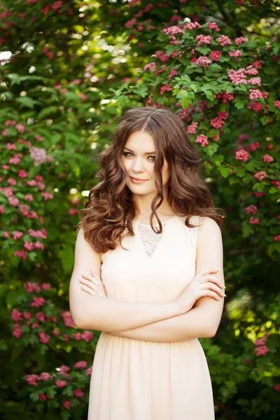 Woman and flowers — Stock Photo, Image