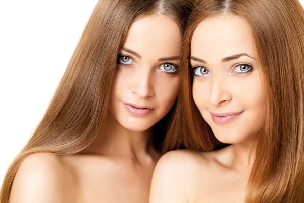 Beauty portrait of two beautiful young women — Stock Photo, Image