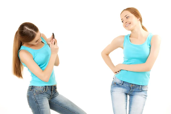 Two women make the photo to mobile phone — Stock Photo, Image