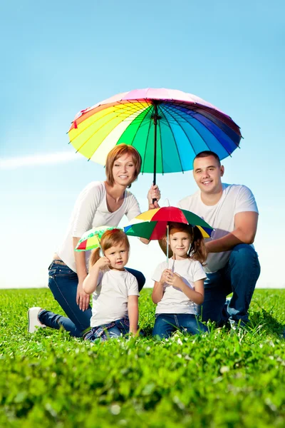 Happy family together in outdoor park at sunny day. Mom, dad an — Stock Photo, Image