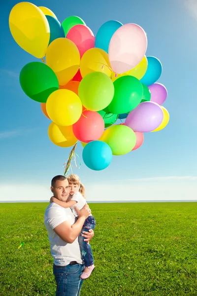 Happy family together in outdoor park at sunny day. Dad and dau — Stock Photo, Image