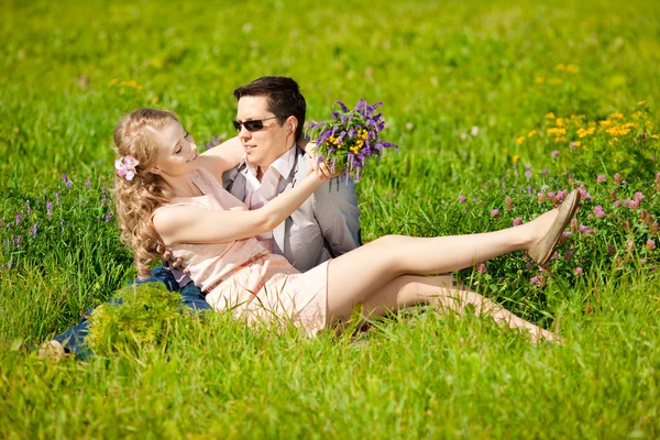 Happy young adult couple in love on the field. Two,  man and wom — Stock Photo, Image