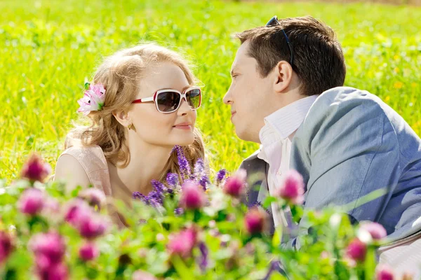 Happy young adult couple in love on the field. Two,  man and wom — Stock Photo, Image