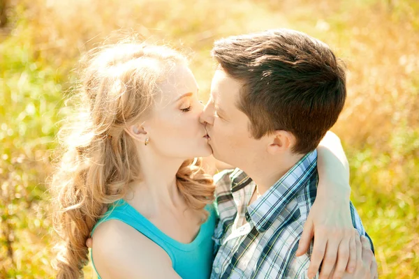 Happy young adult couple in love on the field. Two,  man and wom — Stock Photo, Image