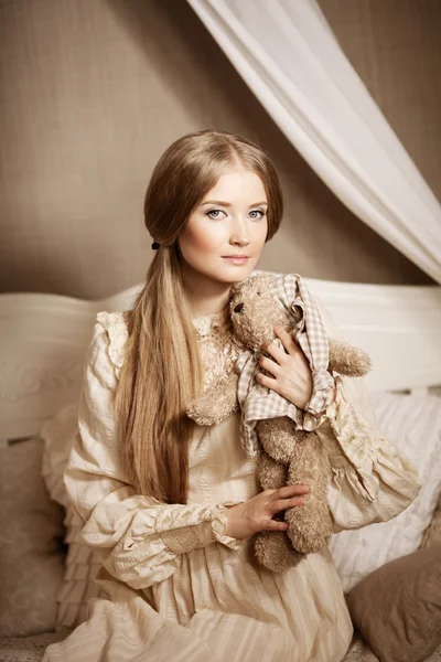 Beautiful young girl in a vintage dress. Gentle pretty woman the — Stock Photo, Image