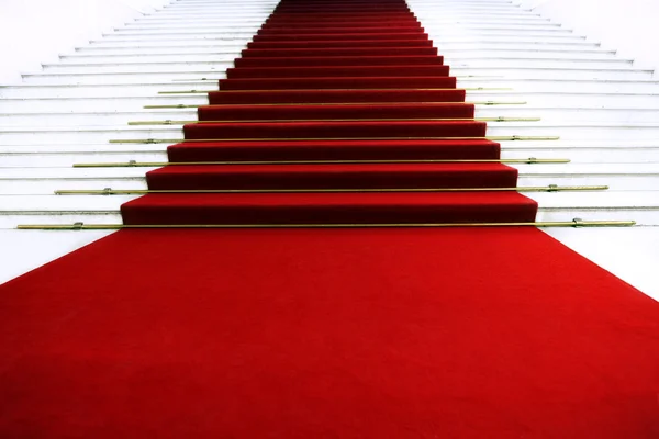 Red carpet on staircase — Stock Photo, Image