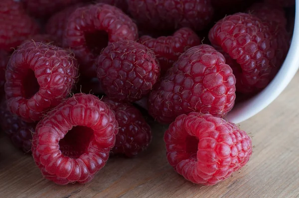 Raspberries on table — Stock Photo, Image