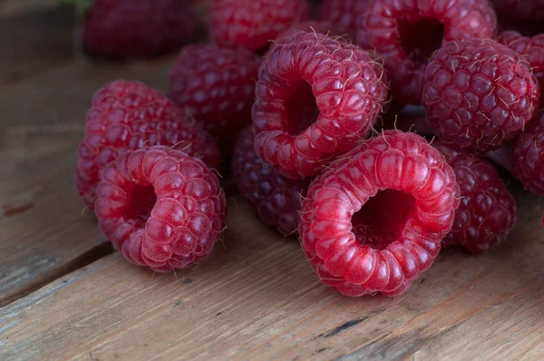 Raspberries on table — Stock Photo, Image