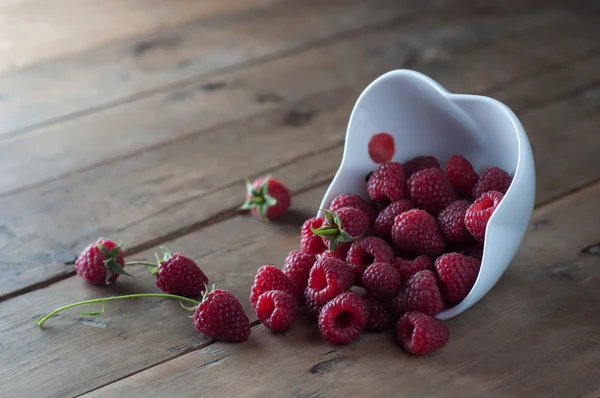 Raspberries in bowl — Stock Photo, Image