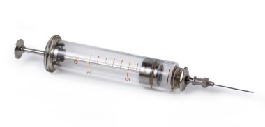 Old syringe isolated on white. Clipping path clipart
