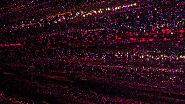 Parlak çok renkli parçacıkların 3 boyutlu yansıması boşluğu enerji ve ışık püskürtüleriyle doldurur. Parlak şenlik dekorasyonu için parlak renkli soyut arkaplan