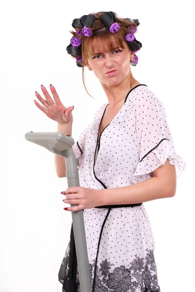 Housewife with vacuum cleaner in hand — Stock Photo, Image