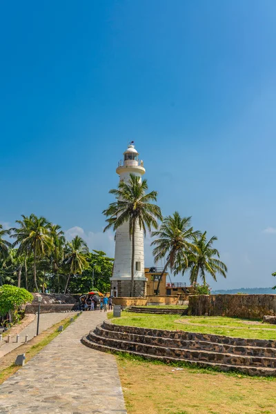 Galle Sri Lanka 2021年12月24日 背景に古い灯台とガレの要塞での方法 — ストック写真