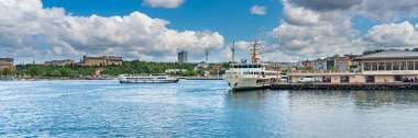 ISTANBUL, TURKEY - MAY 19.2022: View to the harbor in Kadikoy, Ferry to Istanbul. Sea voyage on the bosporus, panorama