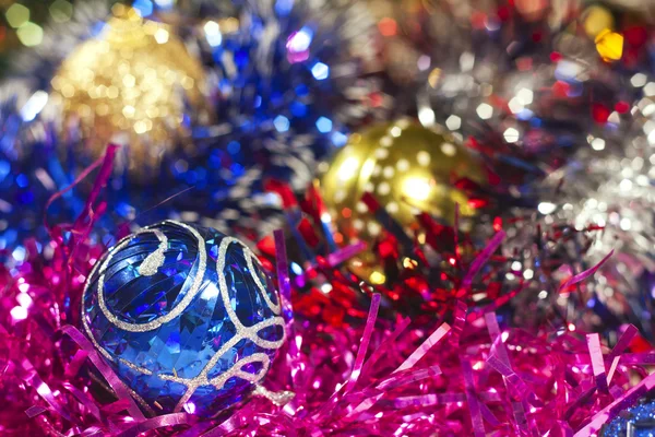Blue and golden Christmas balls and tinsel — Stock Photo, Image