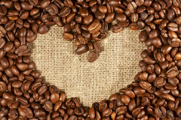 Coffee beans in the shape of heart — Stock Photo, Image