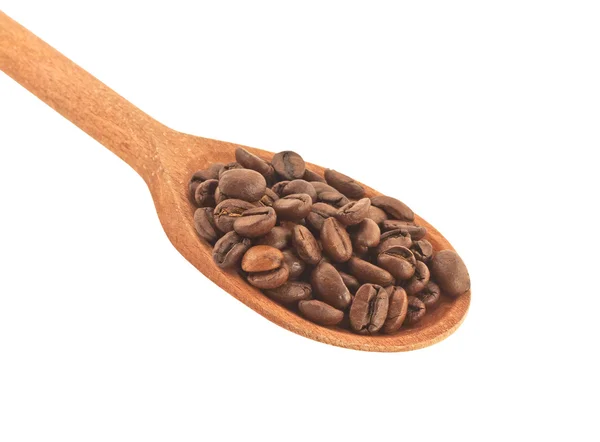 Wooden spoon with roasted coffee beans — Stock Photo, Image