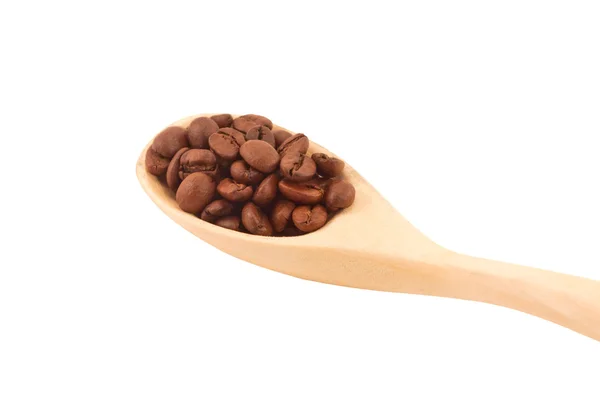 Wooden spoon with coffee beans — Stock Photo, Image