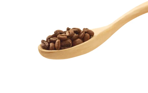 Wooden spoon with coffee beans top view — Stock Photo, Image