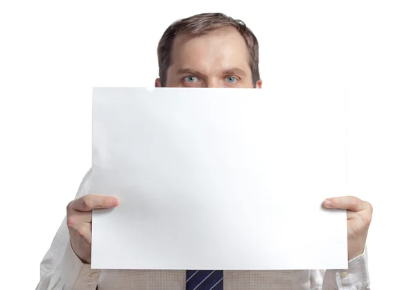 Middle-aged man holding a piece of paper — Stock Photo, Image