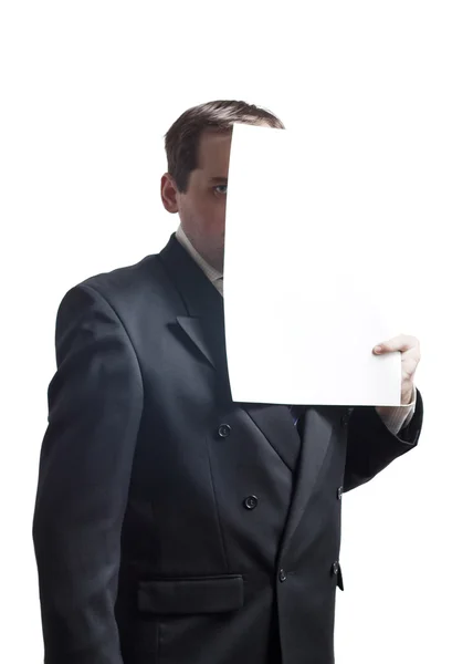 Businessman with a blank paper vertical — Stock Photo, Image