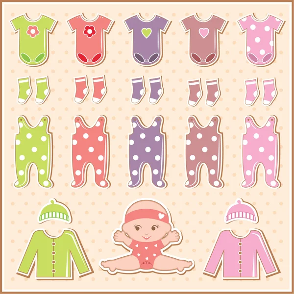 Scrapbook elements with baby clothes — Stock Vector