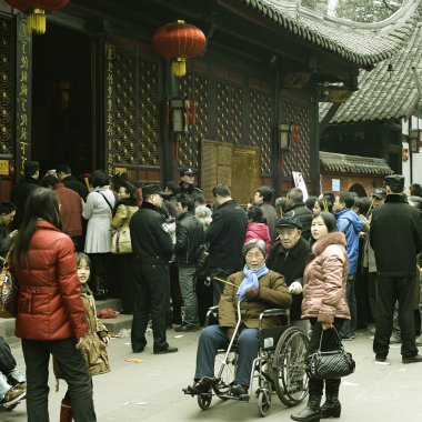 Crowded waiting in line to enter a temple clipart