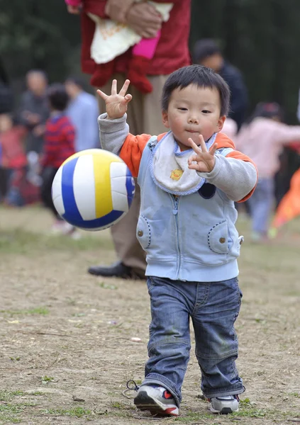 Baby playing football — Stock Photo, Image