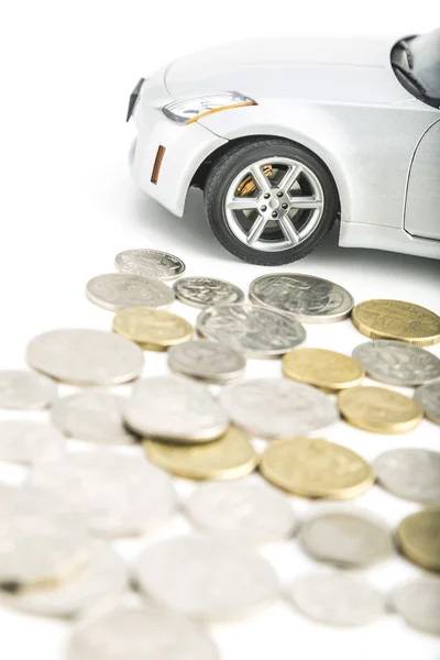 Coins on white with car — Stock Photo, Image