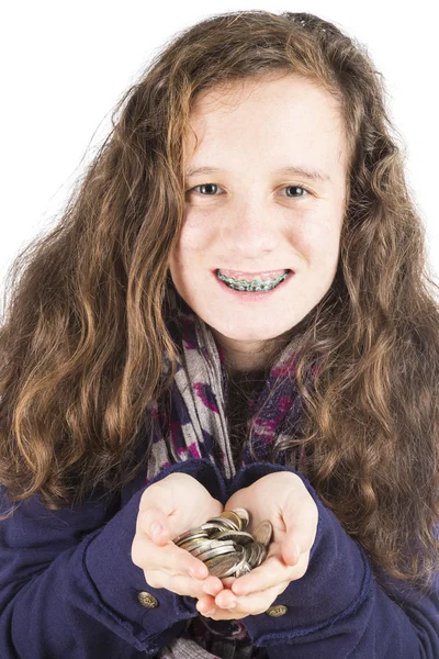 Teen showing her coins — Stock Photo, Image