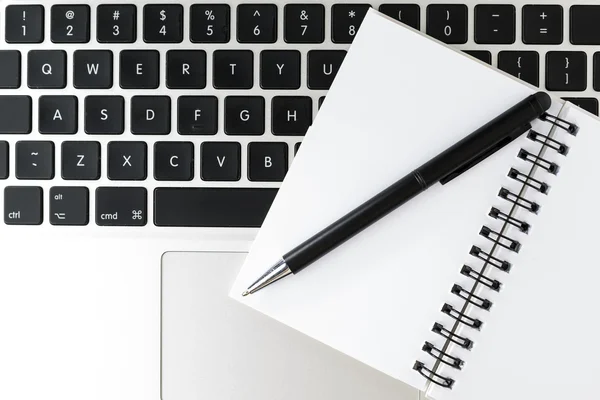 Notebook on a laptop — Stock Photo, Image