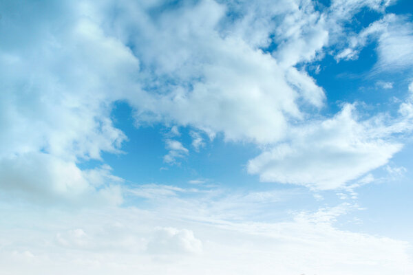 Blue sky background with clouds