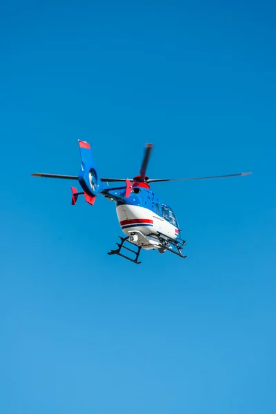 Helicopter on blue sky background — Stock Photo, Image