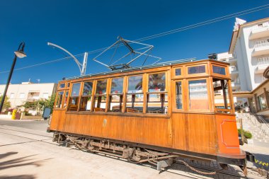 Classic wood tram train of Puerto de Soller clipart