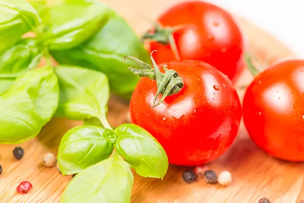Basil leafs cherry tomato pepper corn — Stock Photo, Image