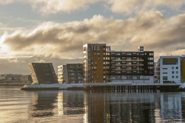 Waterfront buildings in Tromso Norway clipart