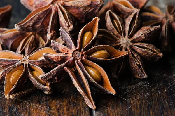 Star anise on wooden table — Stock Photo, Image